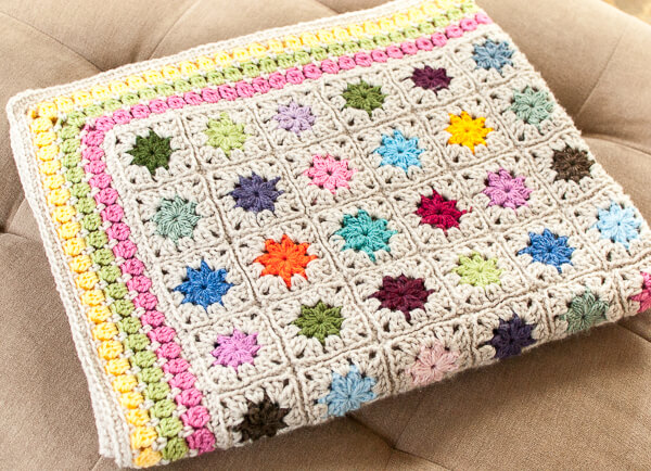 FREE Crochet Throw Blanket Patterns featured by top US crochet blog, Flamingo Toes: Cluster Burst Afghan Crochet Pattern