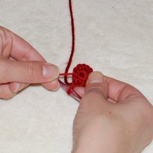 Keep pulling tail until you close up the crochet center. And there's the magic of the magic ring crochet technique!