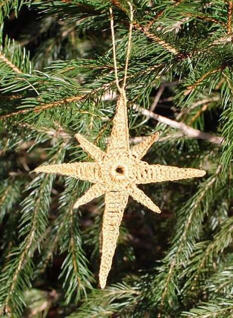 Gold crochet Star of Bethlehem ornament made with metallic thread