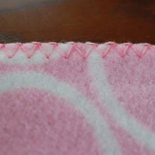 Crochet Edging on Fleece Blanket - Step 2 | www.petalstopicots.com