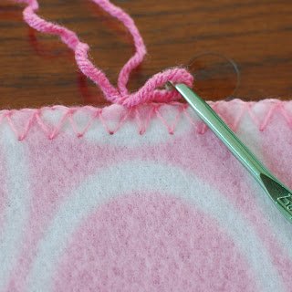 Crochet Edging on Fleece Blanket - Step 3 | www.petalstopicots.com