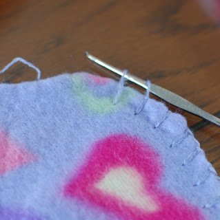 Blanket Stitch for Crochet Border - Step 2 | www.petalstopicots.com