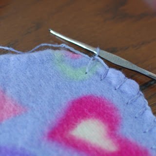 Blanket Stitch for Crochet Border - Step 3 | www.petalstopicots.com