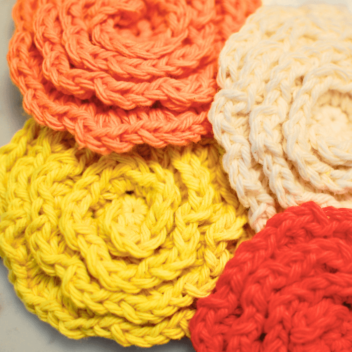 Handmade crochet flower face scrubbies with textured petals