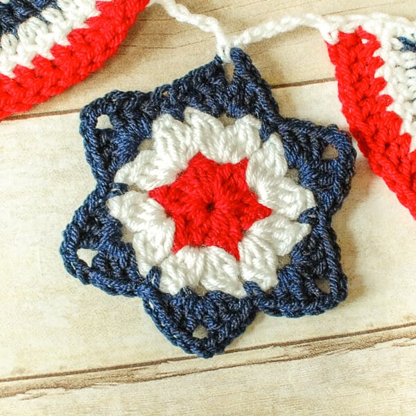 Red, white, and blue six-pointed crochet granny star motif
