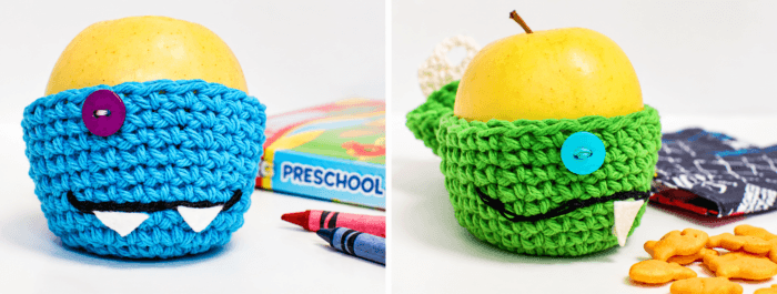 Monster crochet apple cozies opened
