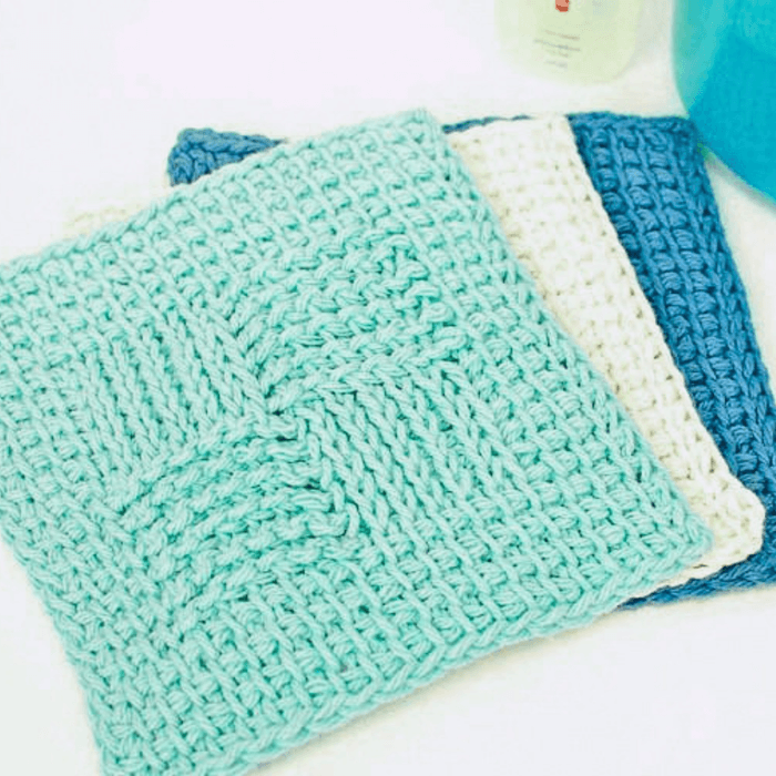 Tunisian crochet sampler washcloth with textured stitch sections