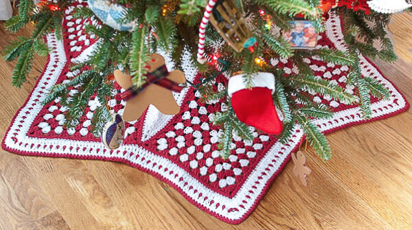 Finished crochet tree skirt under the Christmas tree