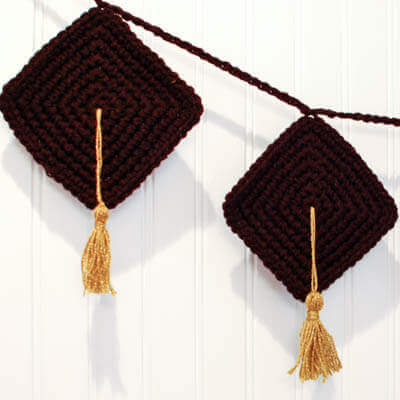 Crafty Graduation Decor ... Crochet Bunting Pattern | www.petalstopicots.com | #crochet #crafts #graduation #bunting #pattern
