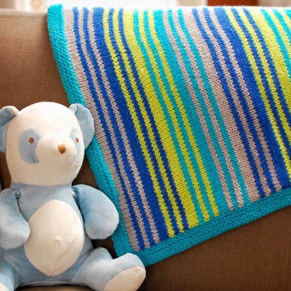 "Grow With Me" Knit Baby Blanket Pattern | www.petalstopicots.com