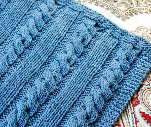 Cables and Columns Knit Blanket Pattern | www.petalstopicots.com | #knit #afghan #cable #blanket