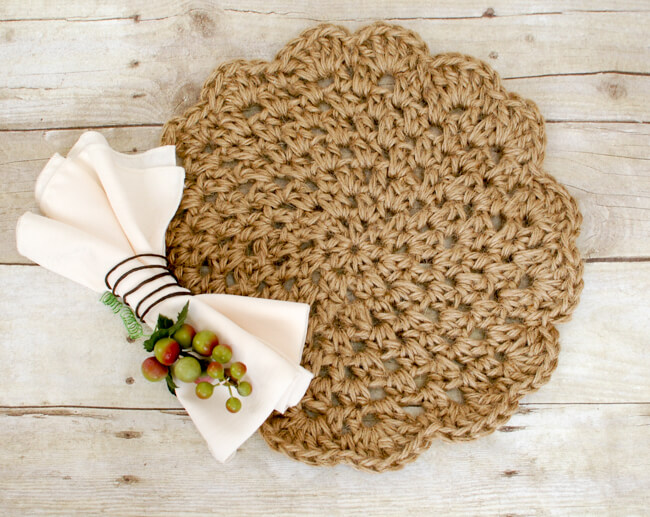 Round crochet placemat worked in jute cord