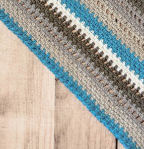 Cozy Striped Shawl Crochet Pattern | www.petalstopicots.com | #crochet #fiber