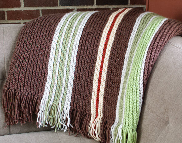 Vertical Striped Crochet Afghan Pattern | www.petalstopicots.com