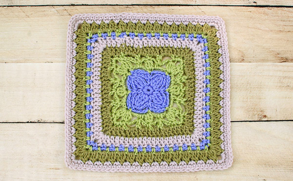 Aubrieta Bloom Afghan Square Crochet Pattern | www.petalstopicots.com
