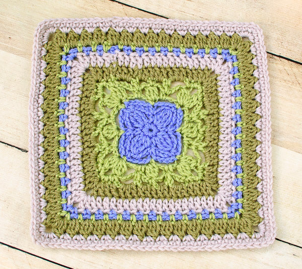 Aubrieta Bloom Afghan Square Crochet Pattern | www.petalstopicots.com