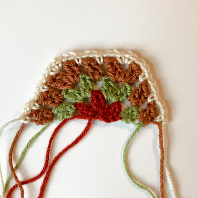 How to crochet half hexagons to create a straight edge.