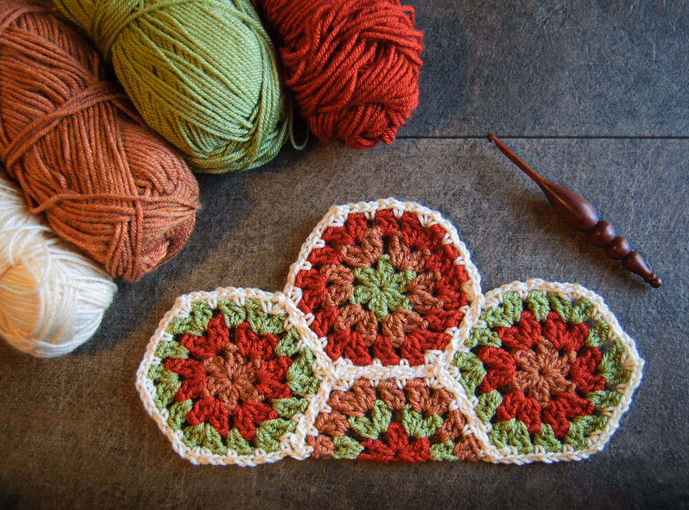 Crochet half hexagon joined to full hexagons for a straight edge.