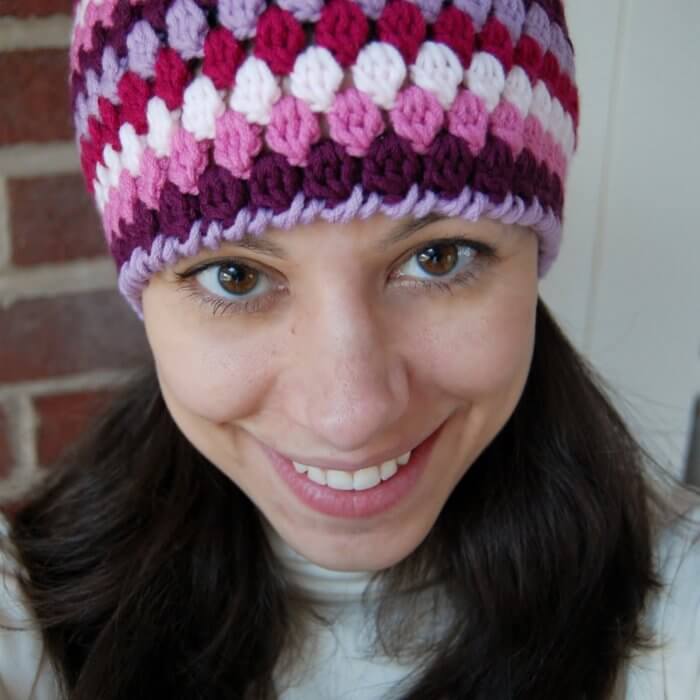 Five colors are used to crochet the adult hat size of the Cluster Stitch Mod Hat.