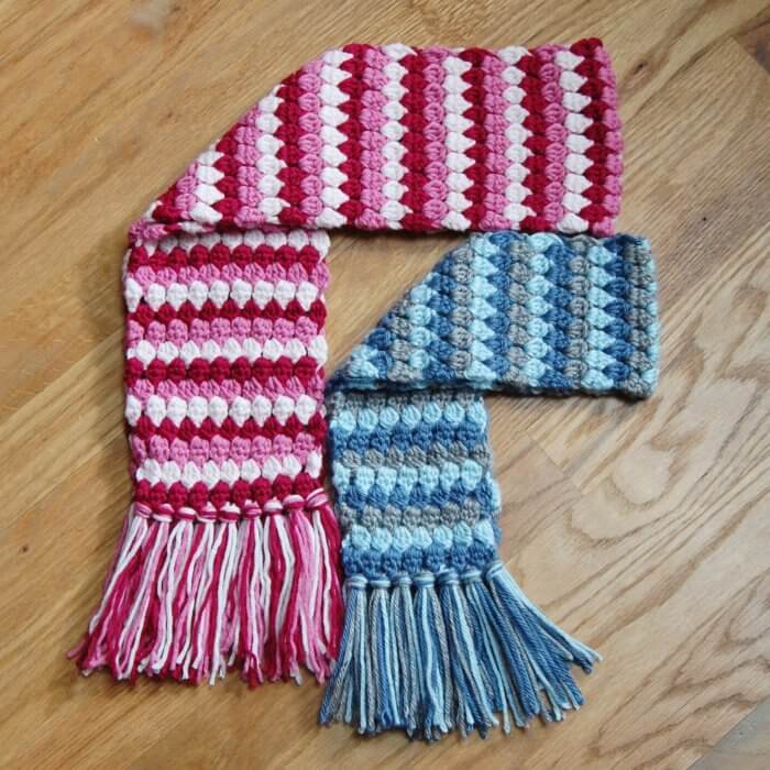 Child and toddler size Mod Scarf patterns worked in three colors.