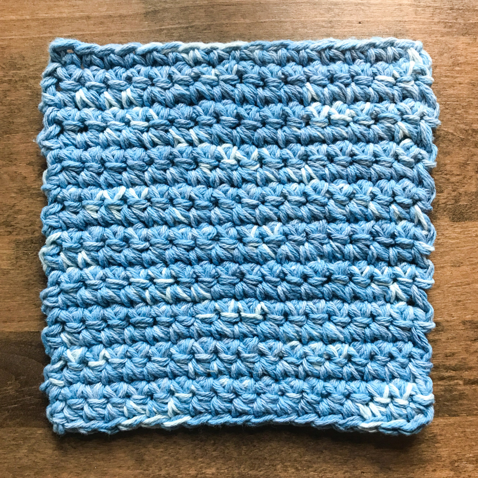 easy-crochet-hot-pads-worked-with-two-strands-of-yarn-petals-to-picots