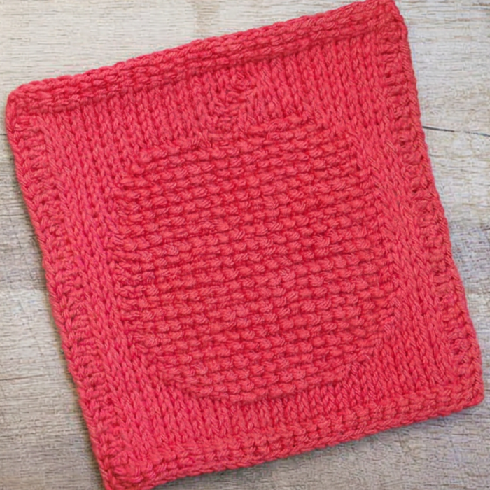 Item at a slight angle on unchanged background Apples Tunisian Dishcloth
